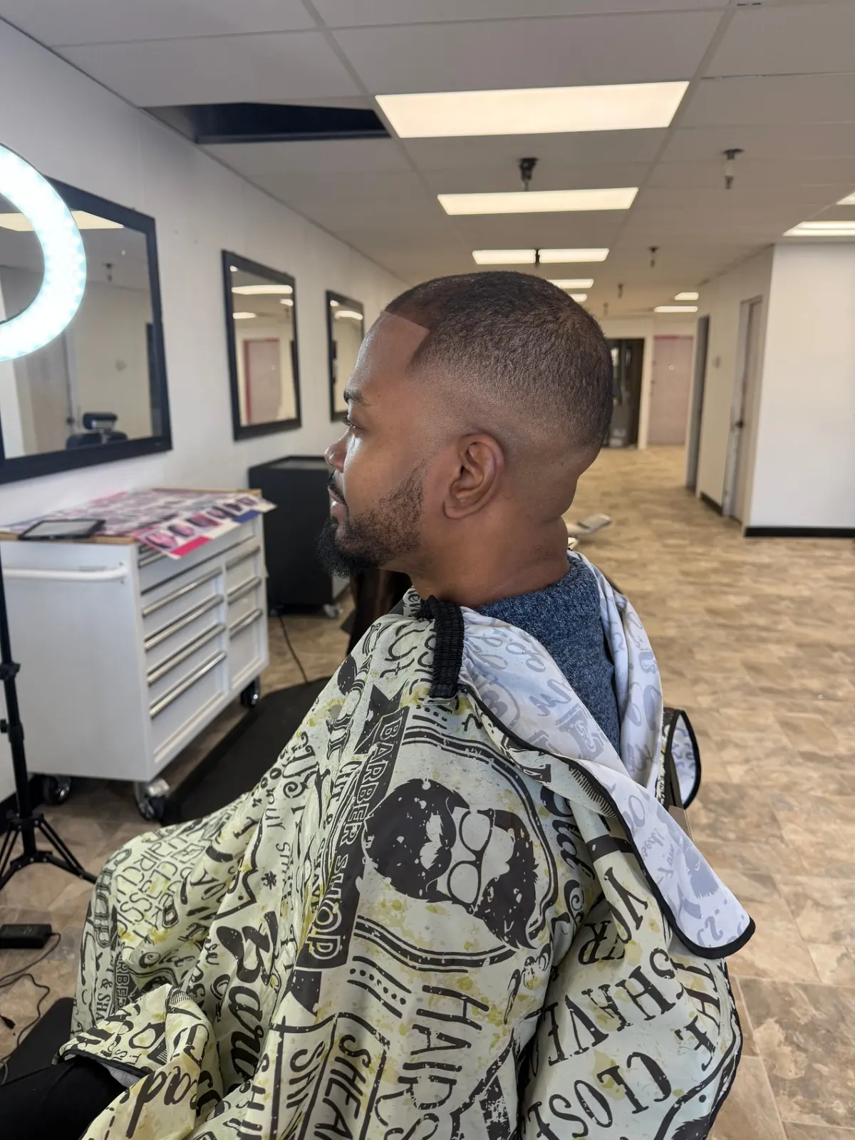 Fresh bald fade with beard shape-up at Gentleman's Barbershop